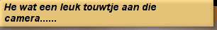 He wat een leuk touwtje aan die camera......